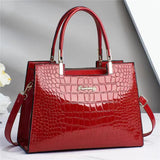 Borsa elegante da donna in vera pelle con finitura lucida