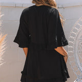 Elegante mini abito babydoll estivo nero con scollo a V
