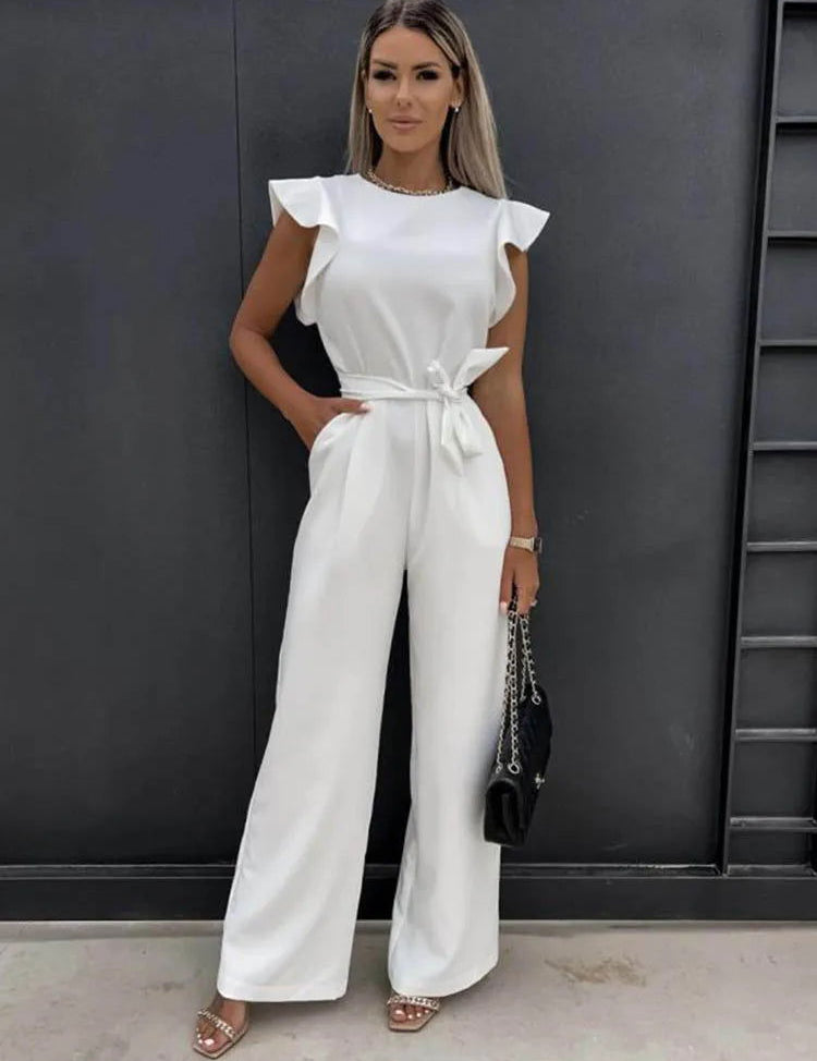 Elegante tuta avorio invernale con dettaglio fiocco chic