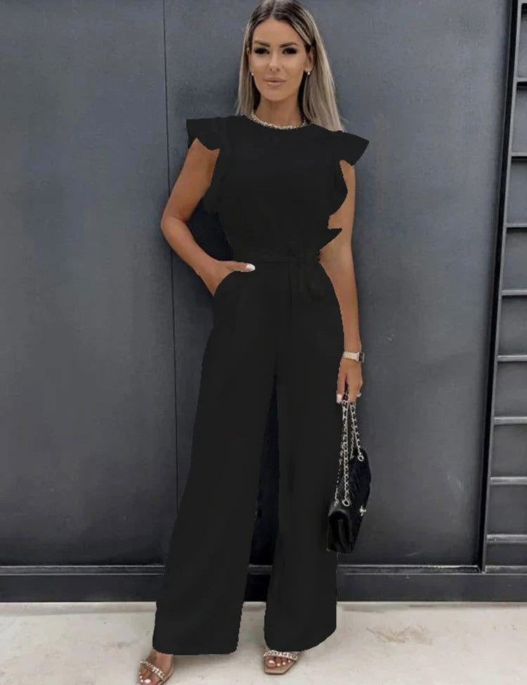 Elegante tuta avorio invernale con dettaglio fiocco chic