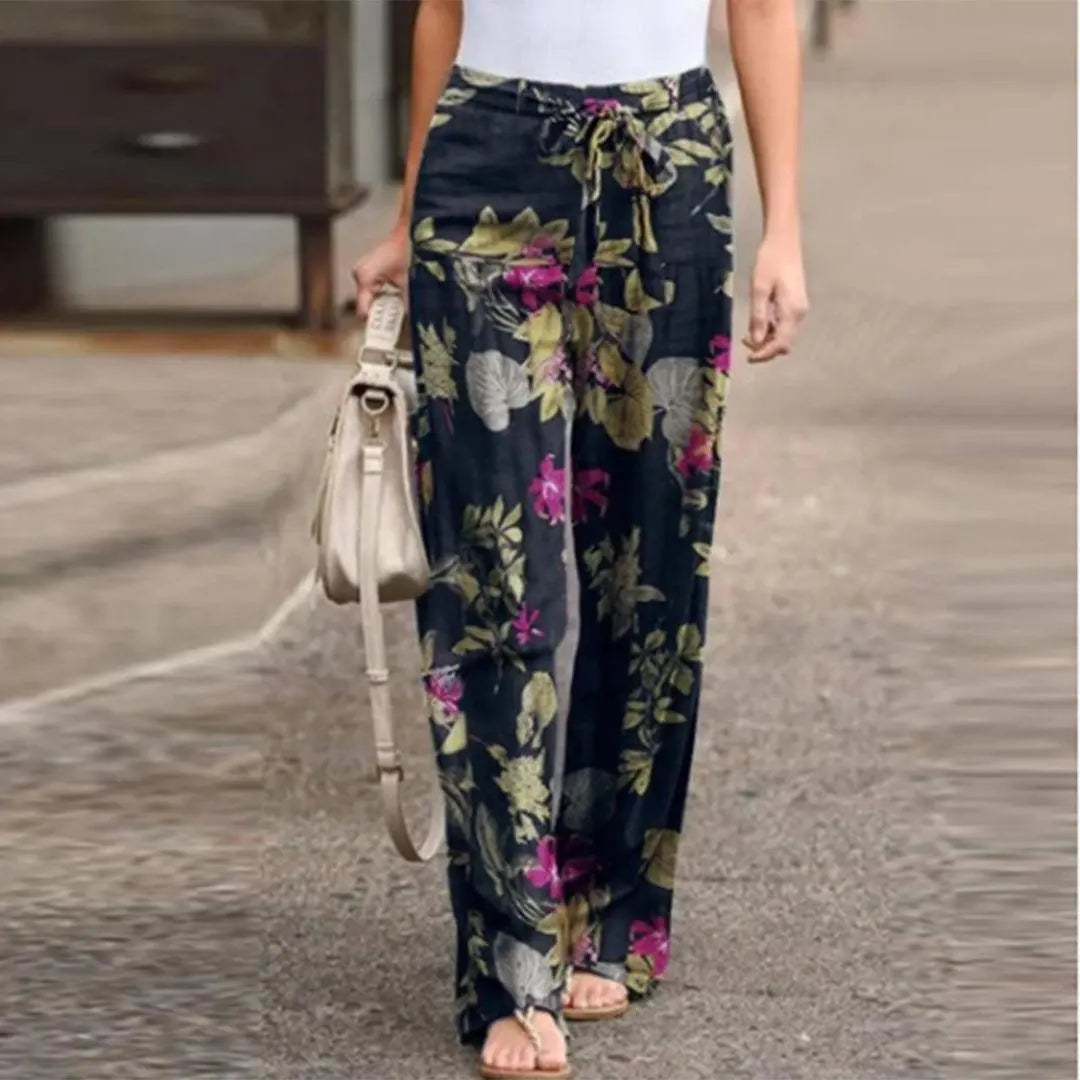 FLORA | Pantaloni autunnali chic con stampa floreale da donna