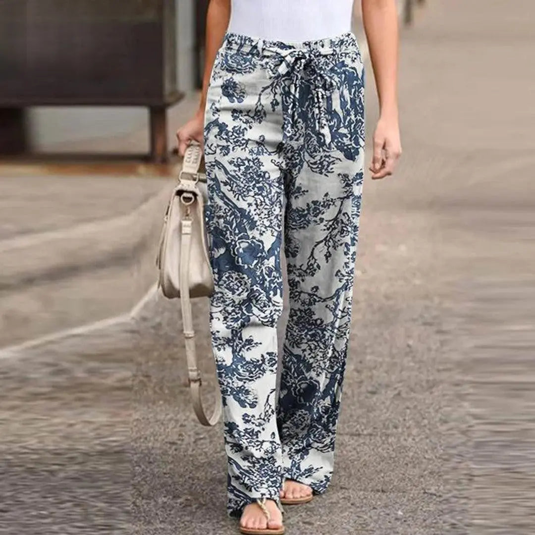 FLORA | Pantaloni autunnali chic con stampa floreale da donna