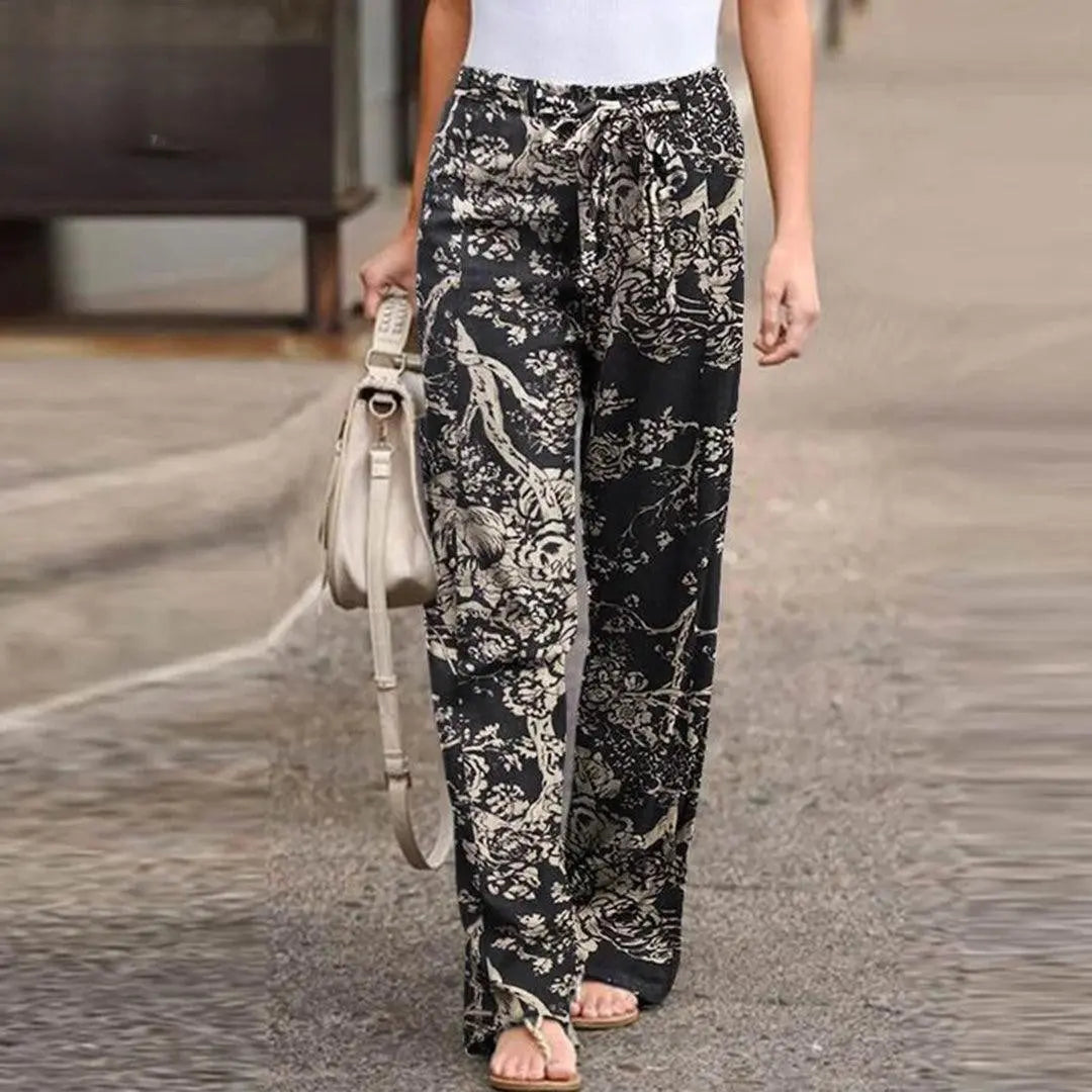 FLORA | Pantaloni autunnali chic con stampa floreale da donna