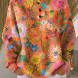 Gaia | Maglione con motivo floreale colorato