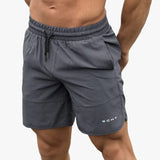 Uomini - Shorts Estivi - Tessuto Leggero Traspirante - Cintura Elastica con Cordone - Lunghezza Media